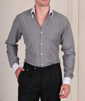 Black and white pinstripe cotton viscose shirt with white contrast collar and cuffs for men by Italian Vega®, styled with black trousers.